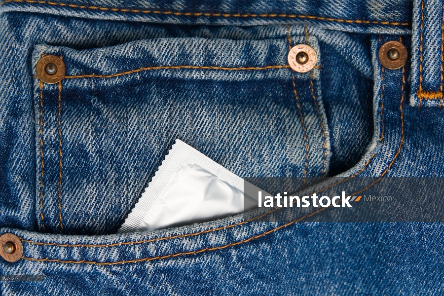 Condom in the pocket of a blue jeans