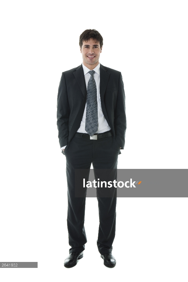 Smiling Businessman with his hands in pockets