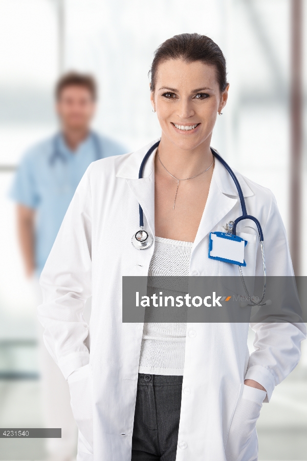 Female doctor standing with hands in pocket